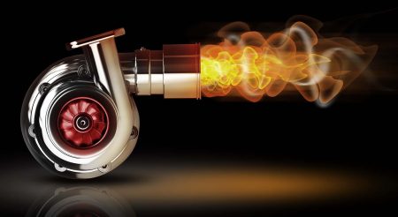 Steel turbocharger with fire isolated on black background. High resolution 3d render